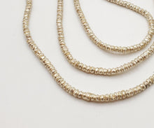 Load image into Gallery viewer, Ethiopian strand of Heishi Silver Beads Hand-Crafted, Silver-Plated Beads, Ethnic Jewelry, Tribal Jewelry,