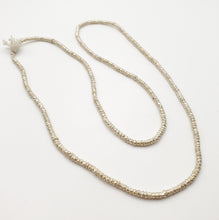 Load image into Gallery viewer, Ethiopian strand of Heishi Silver Beads Hand-Crafted, Silver-Plated Beads, Ethnic Jewelry, Tribal Jewelry,

